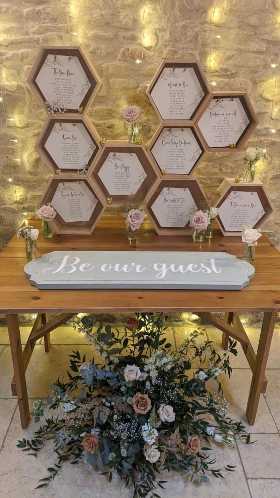 Love this how the Hexagonal frames are used for Seating plan. Venue: Kingscote Barn Stylish: Little wedding helper