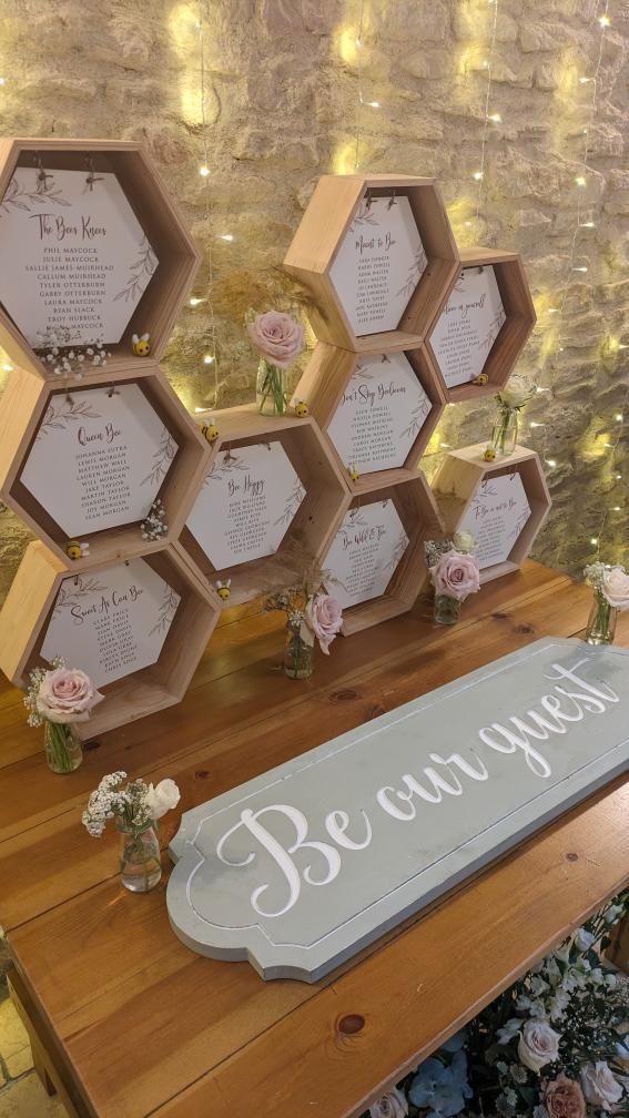 Love this how the Hexagonal frames are used for Seating plan. Venue: Kingscote Barn Stylish: Little wedding helper